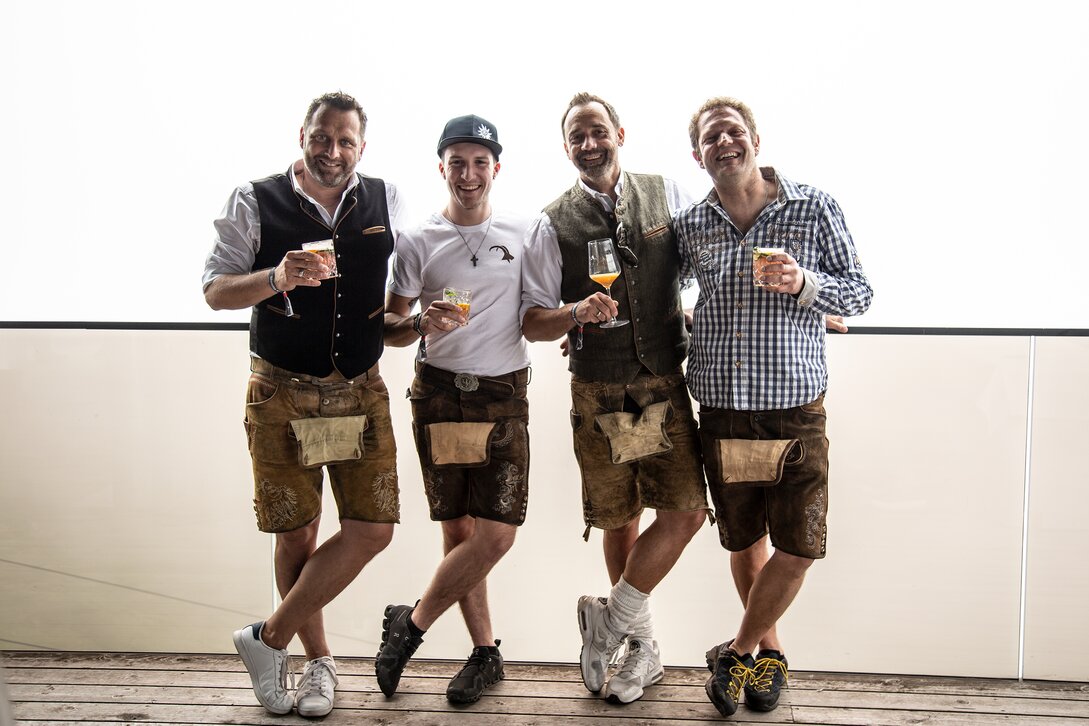 vier Männer in Lederhose beim Weinfest in der Silvretta Montafon | © Silvretta Montafon